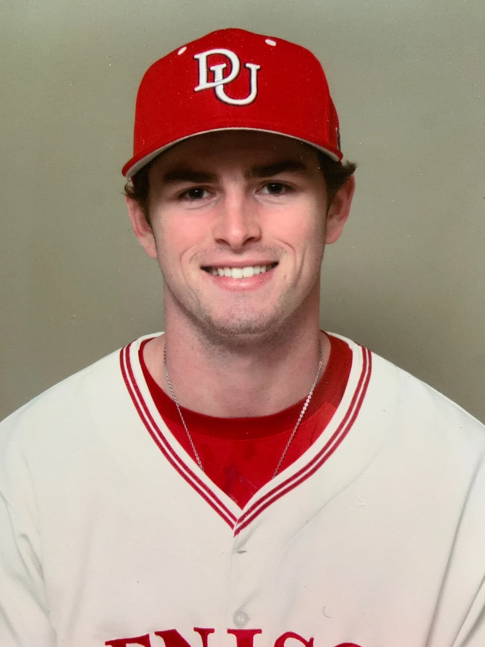 Sean P. Bonner Jr. in his Denison University cap